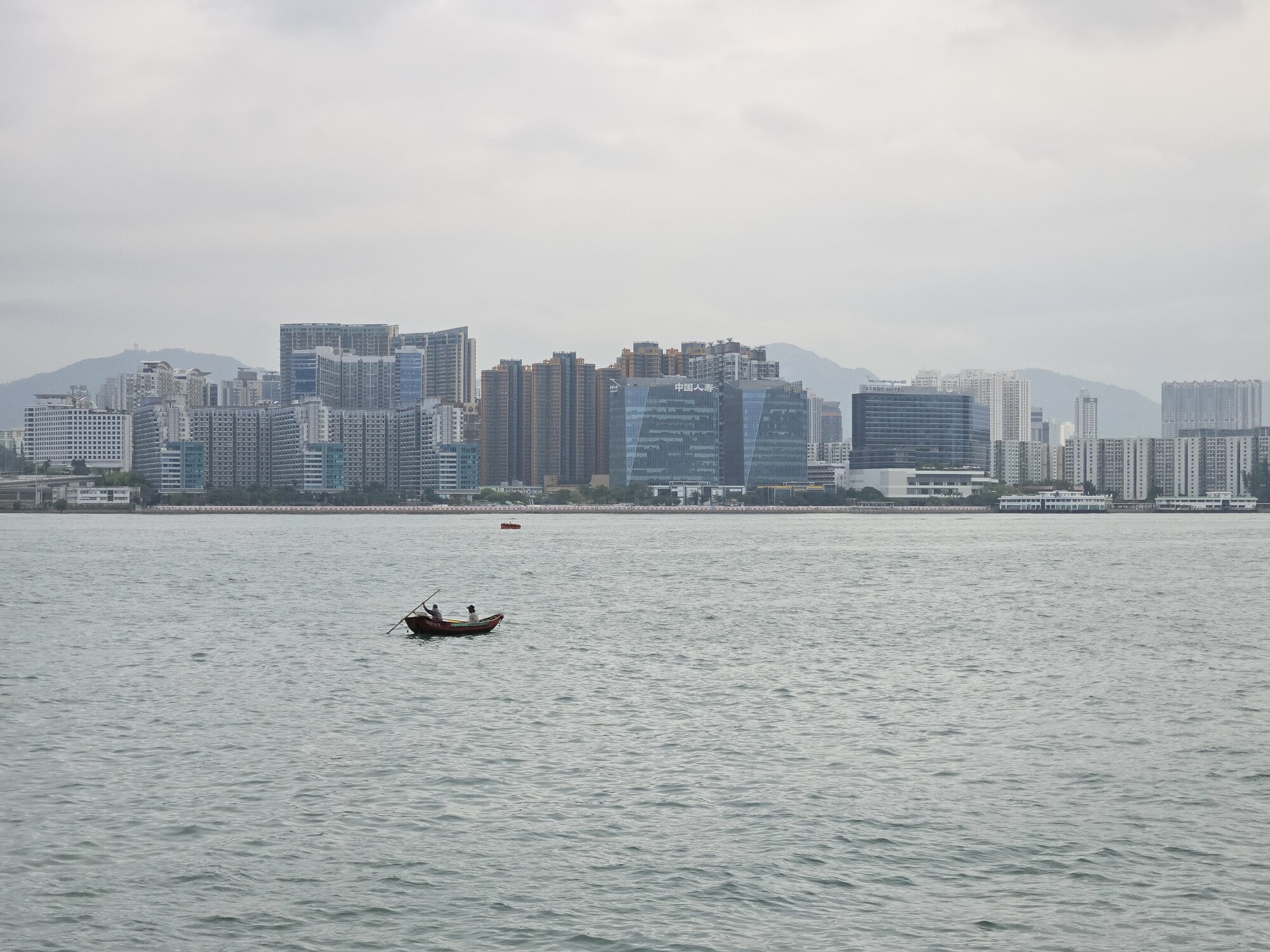A small fishing boat in Victoria Harbor.